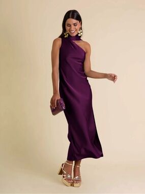 MRS. APRIL DRESS in PLUM- Asymmetrical plum midi dress with a tie at the neck.